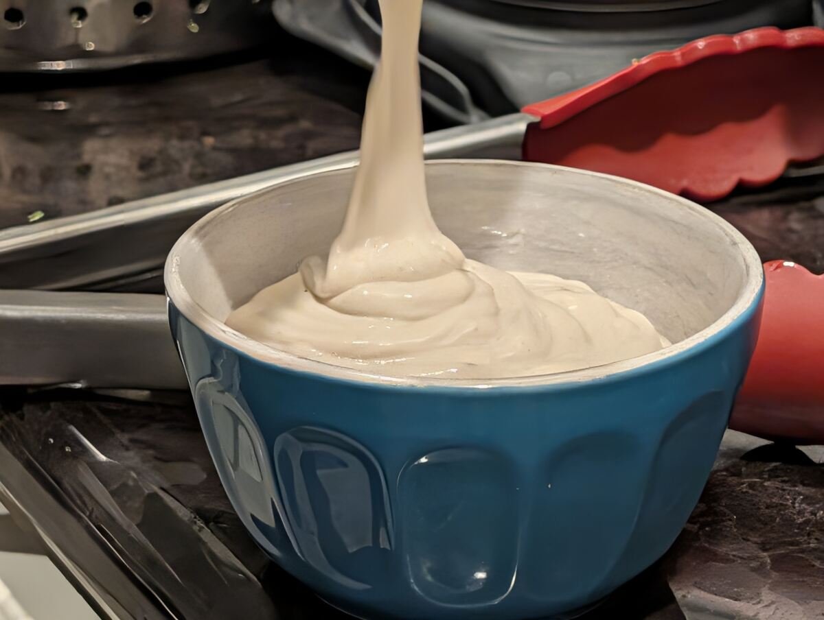 Pouring dressing into a bowl